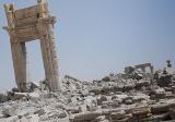 بالصور: داعش يفخخ ويدمر هيكل معبد بل في تدمر