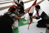 يداً بيد نلون علمنا: مبادرة لتأكيد الوحدة الوطنية يطلقها الشباب السوري